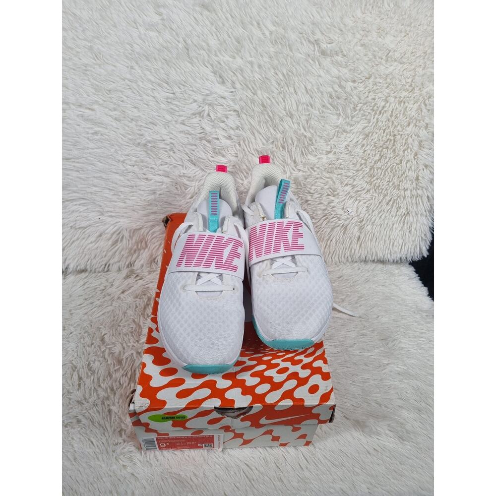 Nike Women's White Running Shoes with Pink Logo